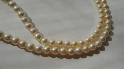 Akoya pearl necklace with genuine ivory pearls sized 8.6-7.0mm, 82cm long with clasp