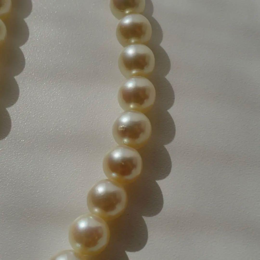 Akoya pearl necklace with genuine ivory pearls sized 8.6-7.0mm, 82cm long with clasp