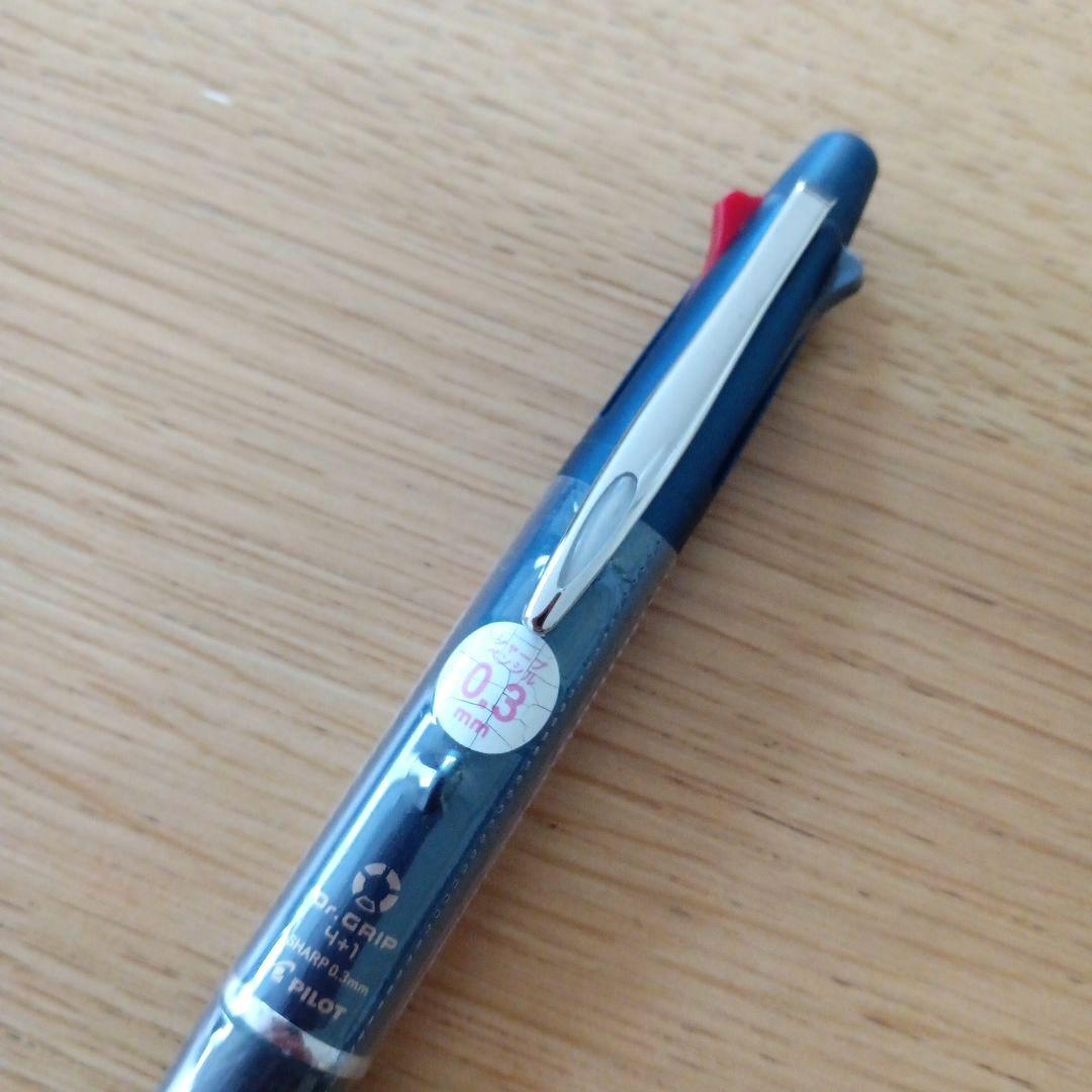 Pilot Dr. Grip 4+1 multifunction pen in blue and black with four ink colors and a mechanical pencil