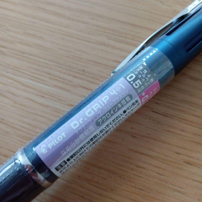 Pilot Dr. Grip 4+1 multifunction pen in blue and black with four ink colors and a mechanical pencil
