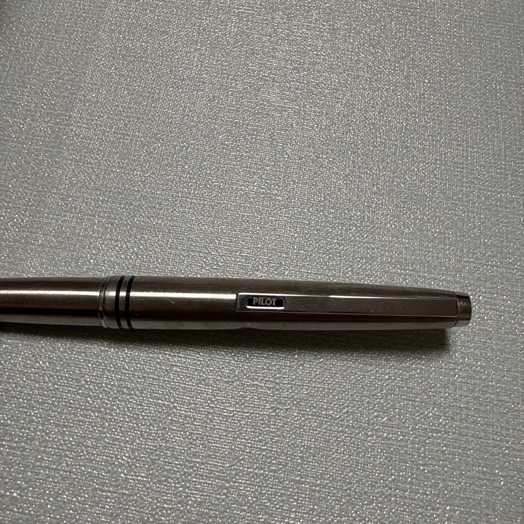 PILOT Silver Fountain Pen with metal body and black grip section on white background