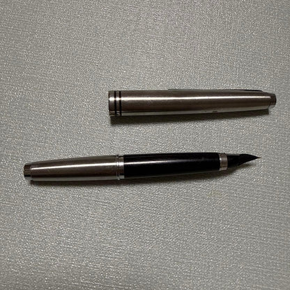 PILOT Silver Fountain Pen with metal body and black grip section on white background