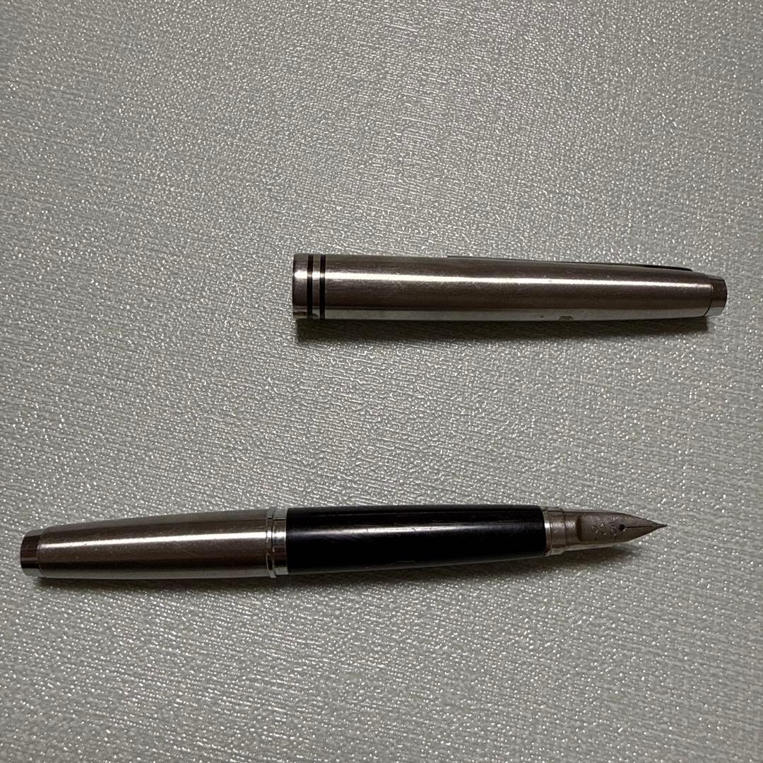 PILOT Silver Fountain Pen with metal body and black grip section on white background