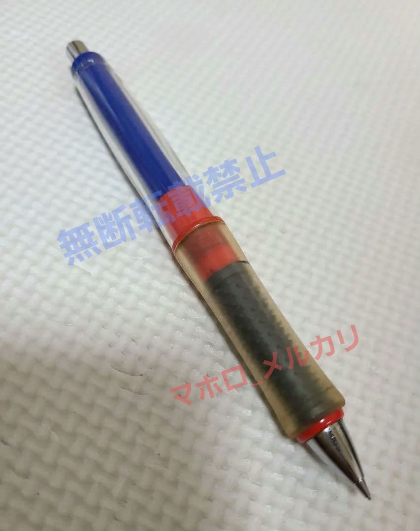 Used Pilot Ofloder Doctor Grip 0.5mm pen half red half blue with visible dirt and grip discoloration