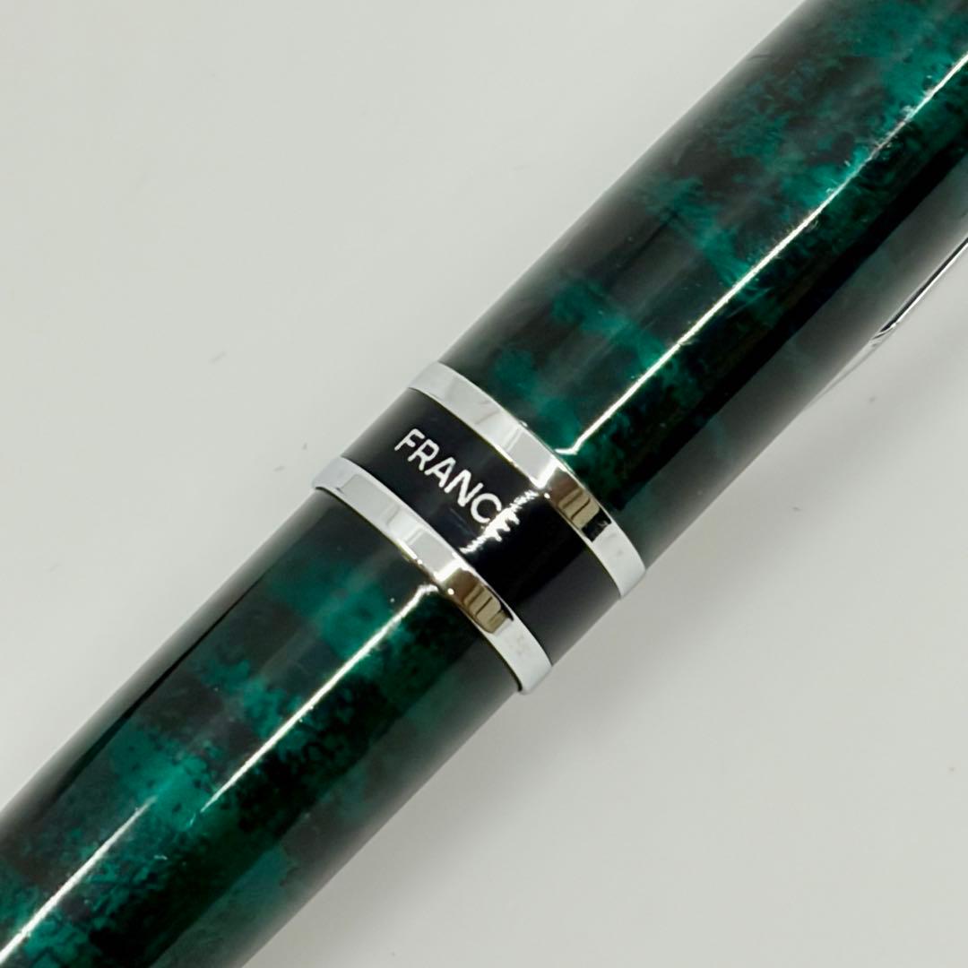 Waterman Expert ballpoint pen in discontinued marble green with chrome trim, shown with cap on