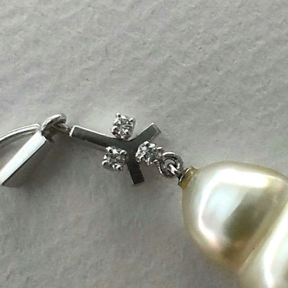 K14WG Mikimoto white South Sea pearl pendant top with three diamonds and 17.7mm drop-shaped golden pearl