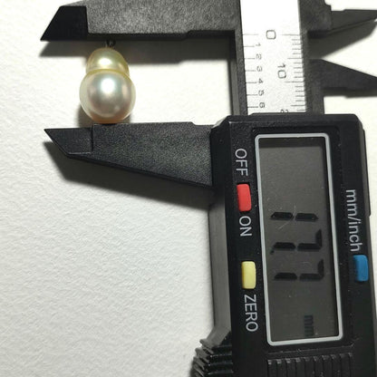 K14WG Mikimoto white South Sea pearl pendant top with three diamonds and 17.7mm drop-shaped golden pearl