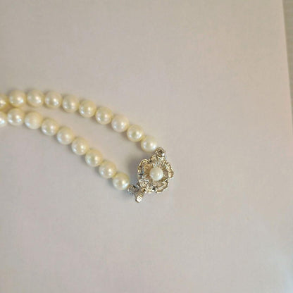 Akoya pearl necklace with 6.8mm pearls on a 40cm silver chain PN303