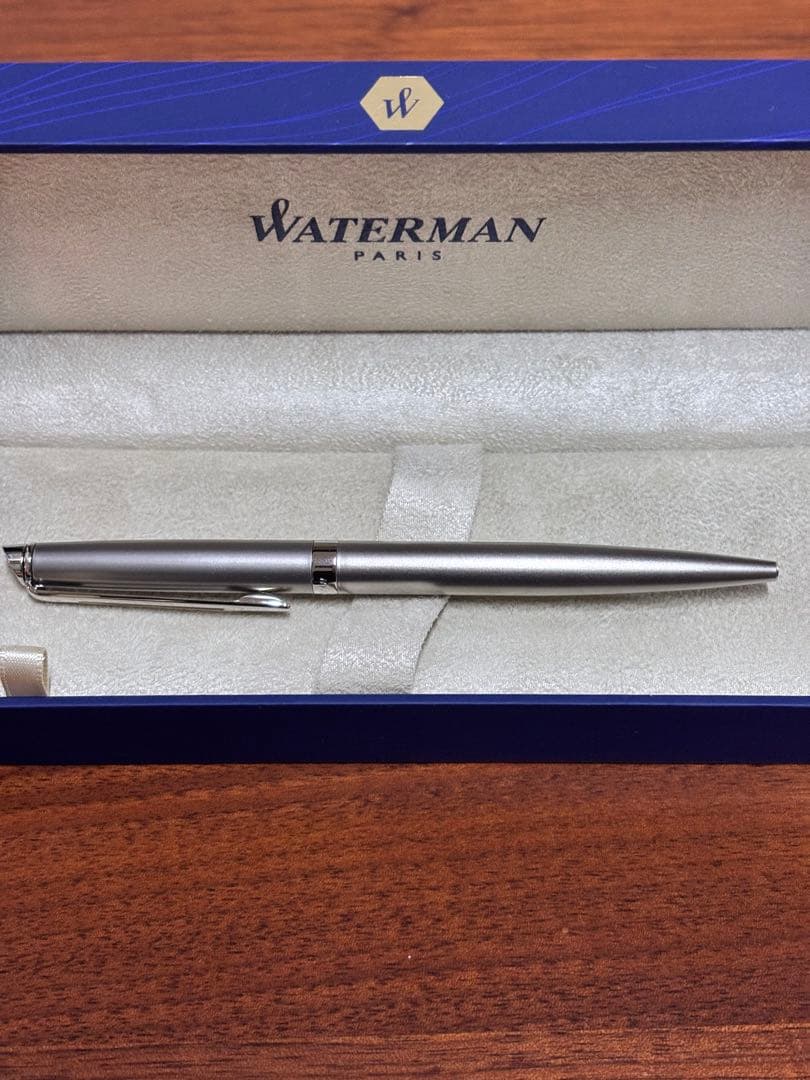 WATERMAN Paris ballpoint pen in sleek design with black and silver finish, shown uncapped