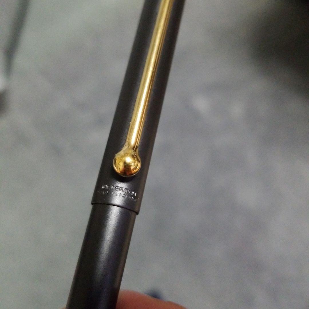 Waterman Ballpoint Pen approximately 13 cm long with black barrel and silver accents