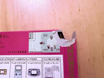 MOTHER3 Game Boy Advance game with outer box, inner box, and instruction manual showing slight box tears