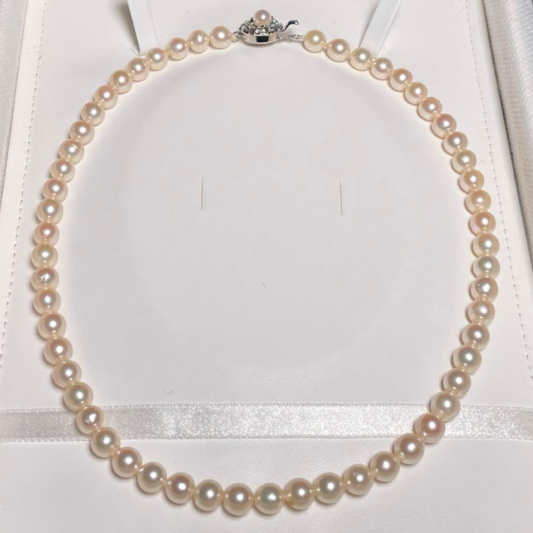Akoya pearl necklace with 7.0-7.4mm semi-round white pearls on a 43.7cm silver chain