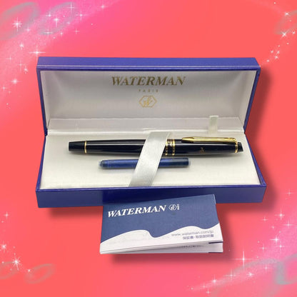 Waterman Expert Essential fountain pen with fine nib in black and gold, displayed with box and replacement cartridge
