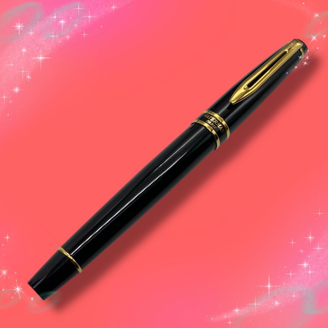 Waterman Expert Essential fountain pen with fine nib in black and gold, displayed with box and replacement cartridge
