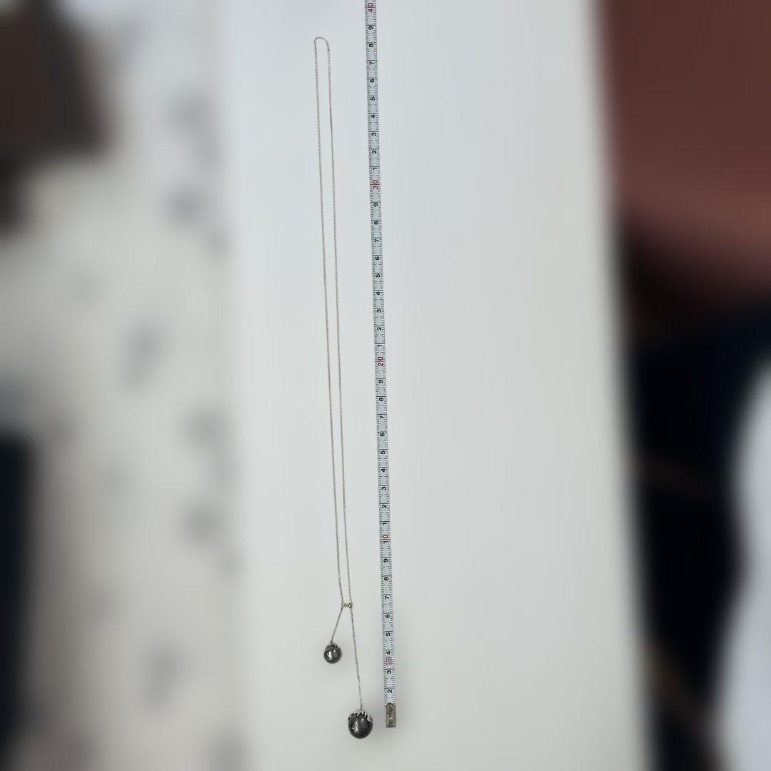 Agat Pearl Necklace made with South Sea pearls showing bubble inclusions, worn but in usable condition