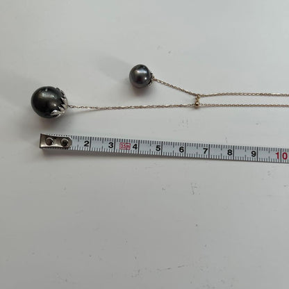 Agat Pearl Necklace made with South Sea pearls showing bubble inclusions, worn but in usable condition