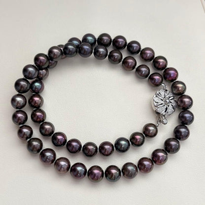 Akoya pearl necklace with 8-8.5mm peacock pearls and silver fittings measuring 45.5cm length