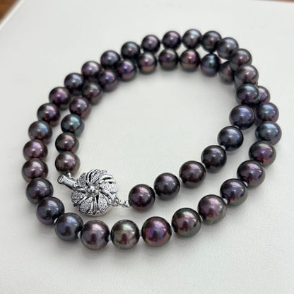 Akoya pearl necklace with 8-8.5mm peacock pearls and silver fittings measuring 45.5cm length