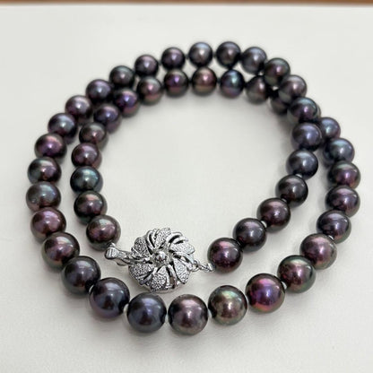 Akoya pearl necklace with 8-8.5mm peacock pearls and silver fittings measuring 45.5cm length