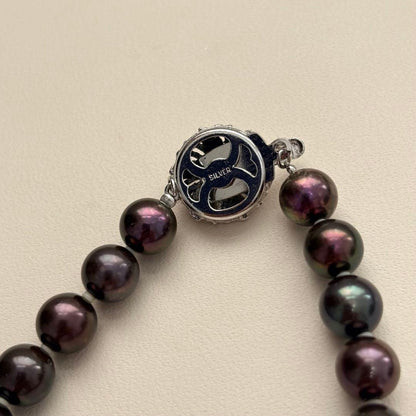 Akoya pearl necklace with 8-8.5mm peacock pearls and silver fittings measuring 45.5cm length