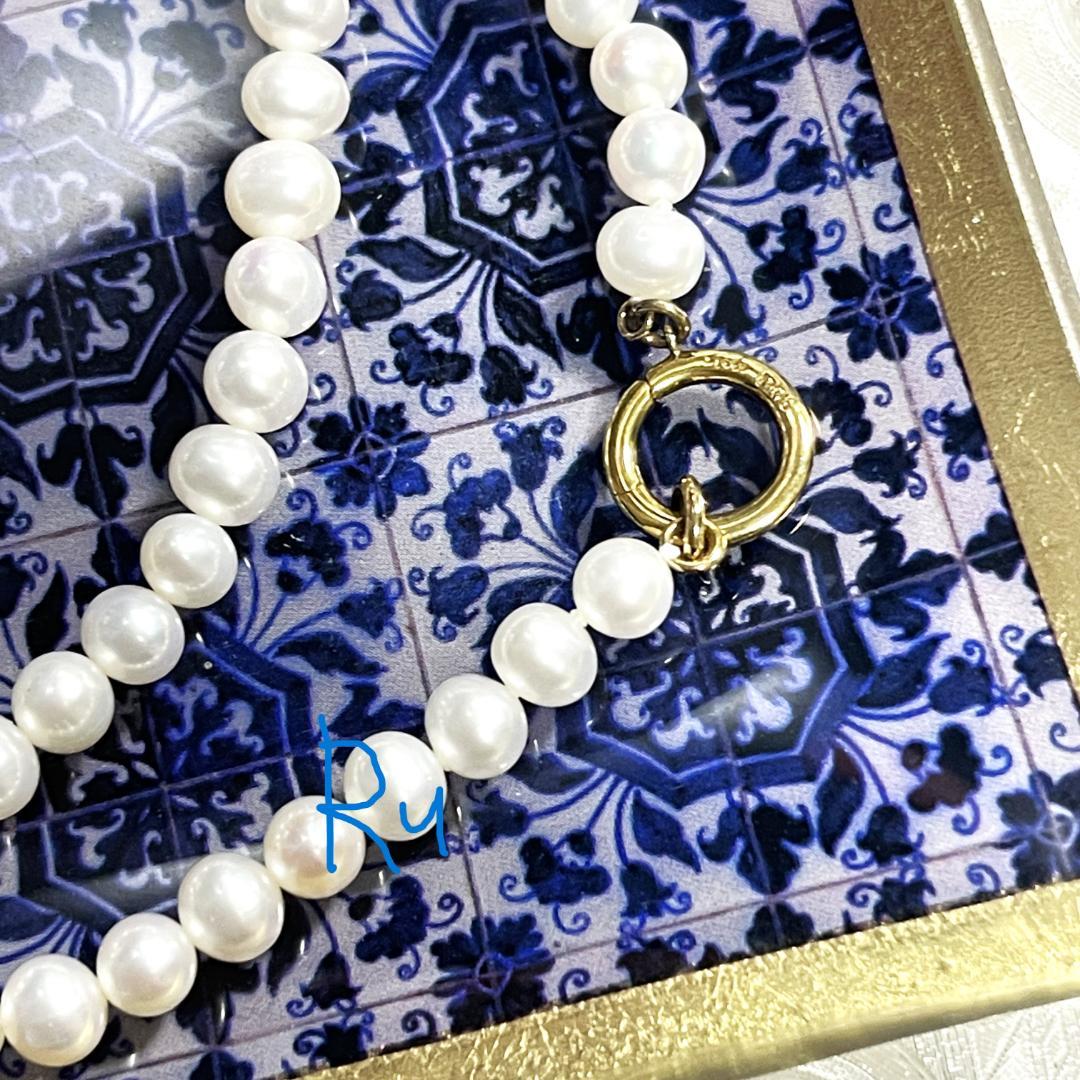 Agete Classic Pearl Clicker Necklace in gold-plated silver featuring pearl and spring sunlight design