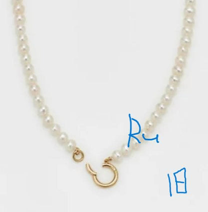 Agete Classic Pearl Clicker Necklace in gold-plated silver featuring pearl and spring sunlight design