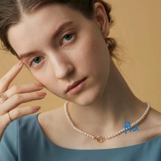Agete Classic Pearl Clicker Necklace in gold-plated silver featuring pearl and spring sunlight design