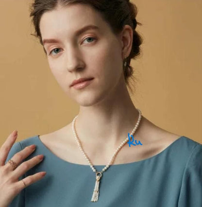 Agete Classic Pearl Clicker Necklace in gold-plated silver featuring pearl and spring sunlight design