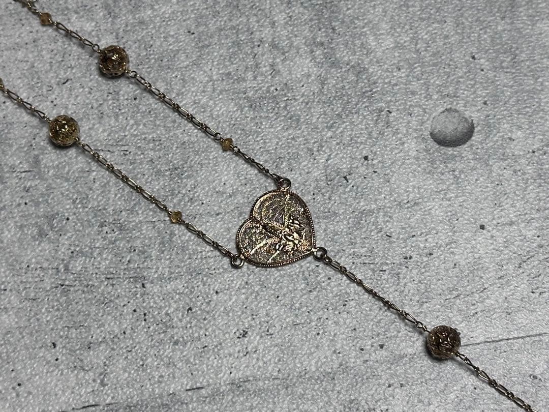 Agete Cross Heart Necklace Silver 925 model 384 with 71.5 cm chain displayed on white background