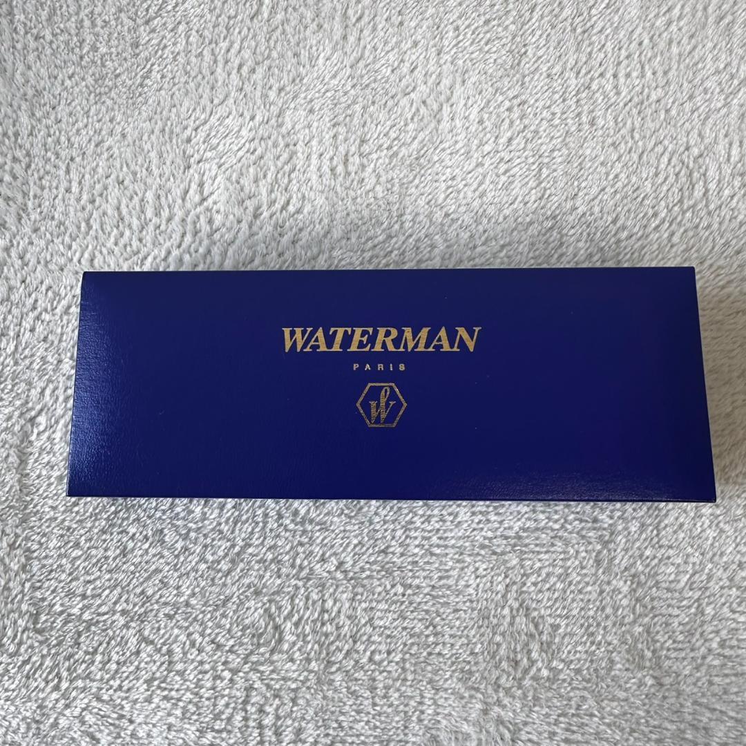 Black Waterman Paris ballpoint pen with included case shown on a white background