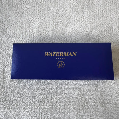 Black Waterman Paris ballpoint pen with included case shown on a white background