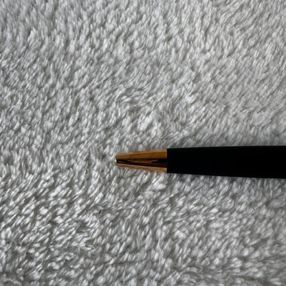 Black Waterman Paris ballpoint pen with included case shown on a white background
