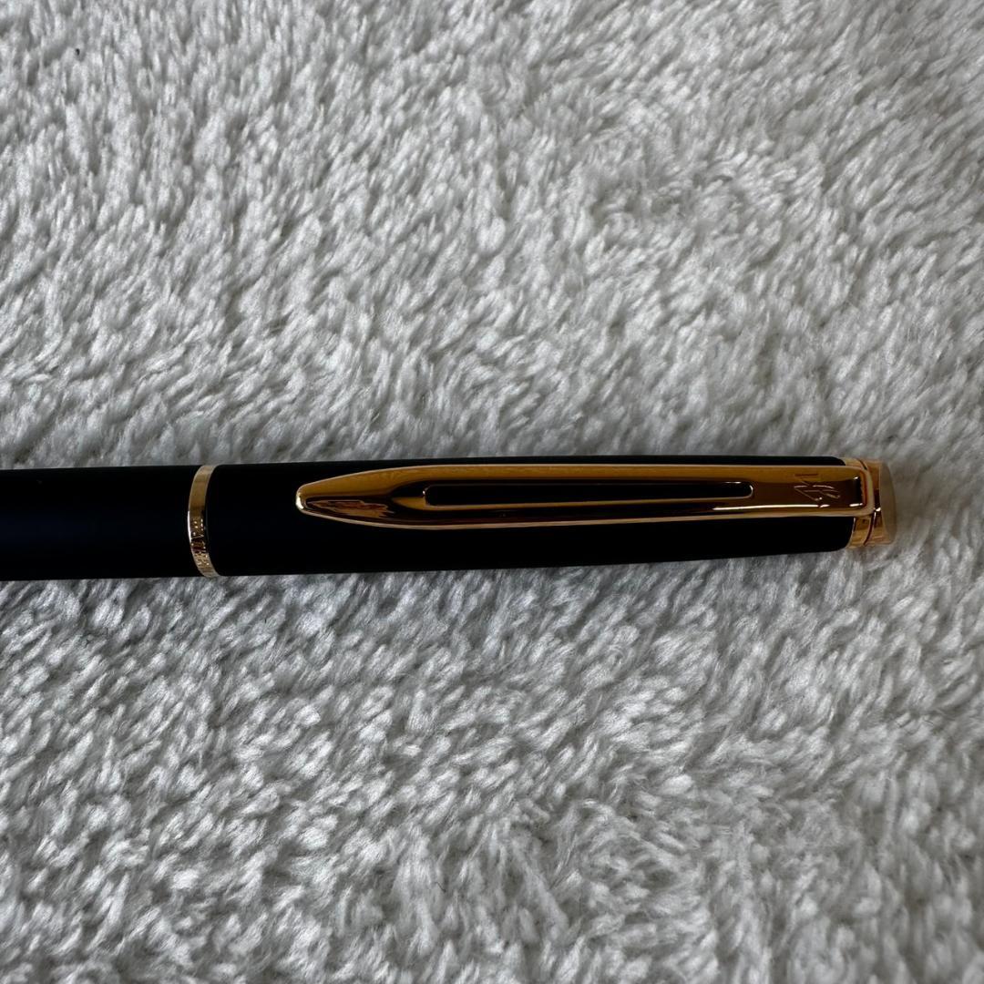 Black Waterman Paris ballpoint pen with included case shown on a white background
