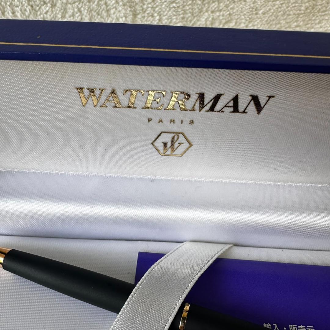 Black Waterman Paris ballpoint pen with included case shown on a white background