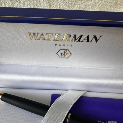 Black Waterman Paris ballpoint pen with included case shown on a white background