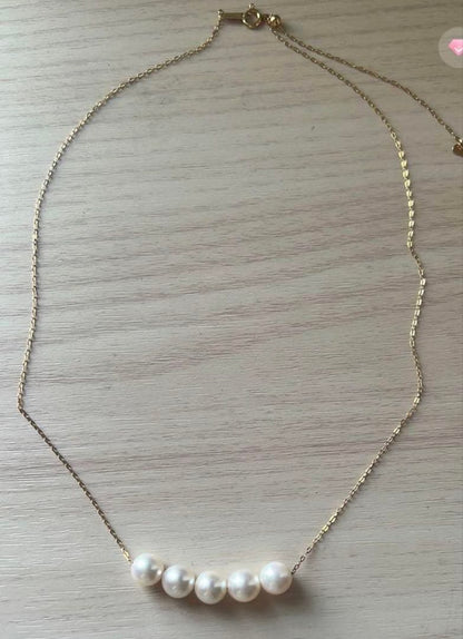 Akoya pearl necklace with 6mm pearls set in 18K yellow gold, 45cm length