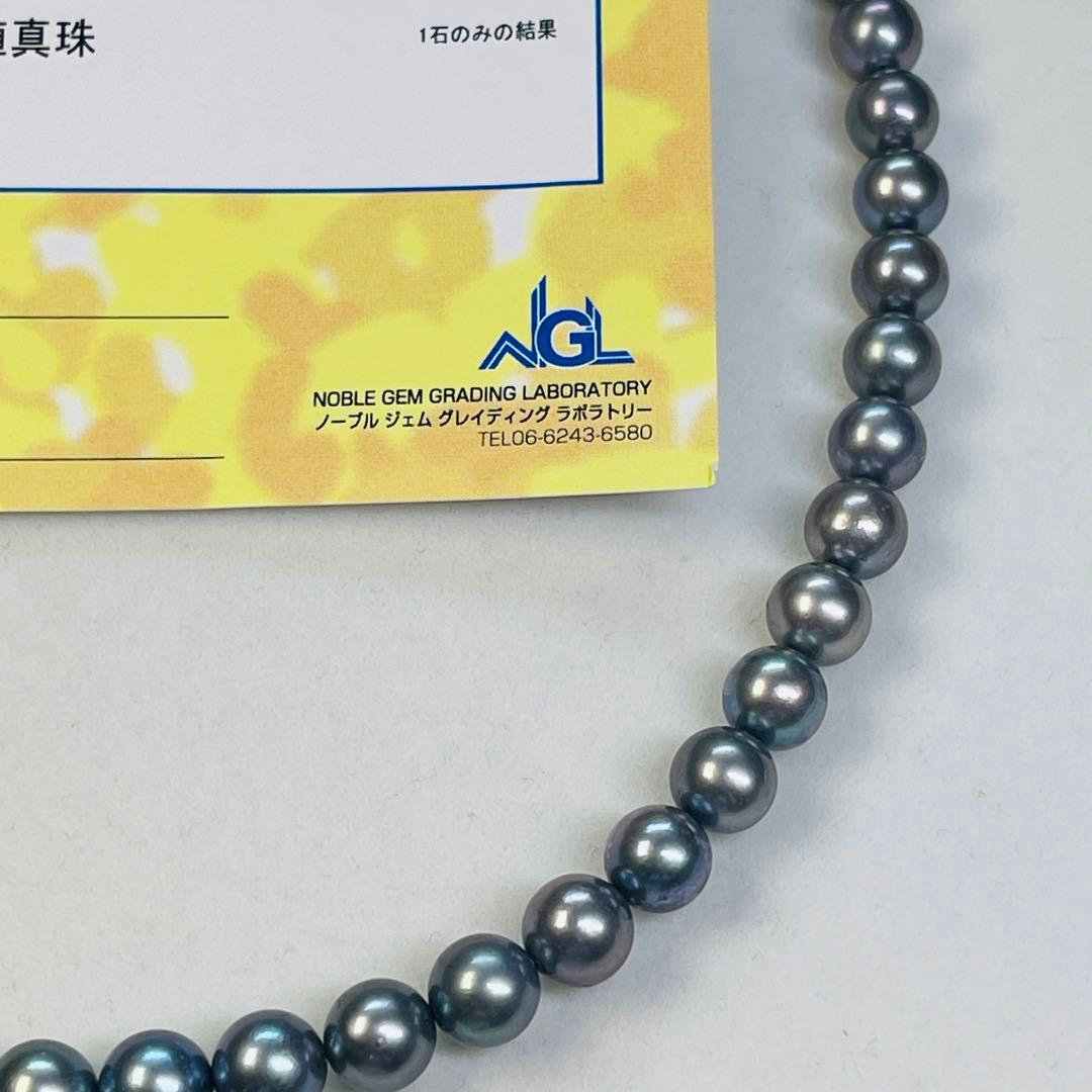 Akoya black pearl necklace with 7.5mm round peacock green pearls on a 43cm silver chain