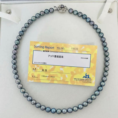 Akoya black pearl necklace with 7.5mm round peacock green pearls on a 43cm silver chain