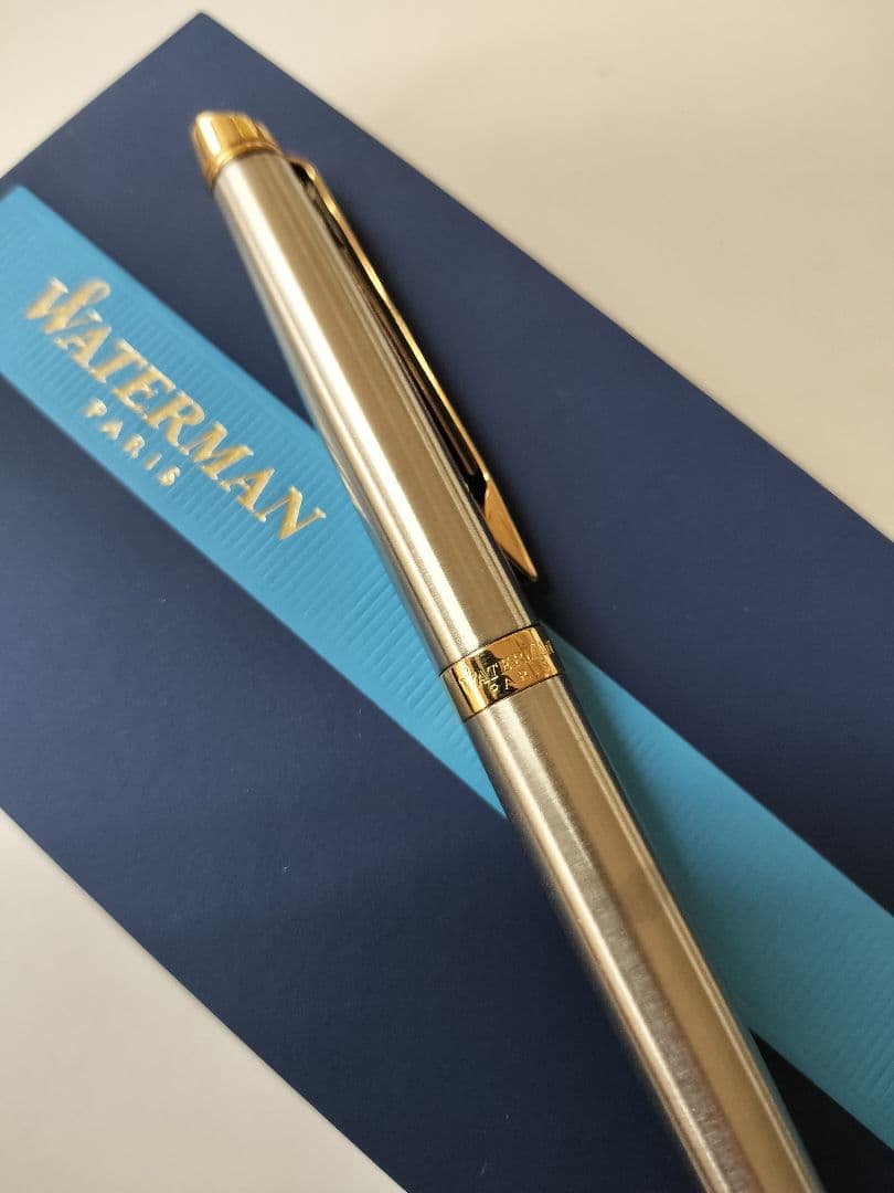 WATERMAN ballpoint pen main body in silver and gold with dedicated case and genuine refill displayed