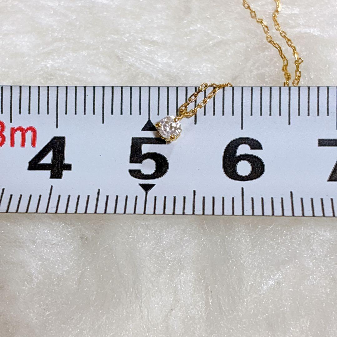 Agete K18 gold necklace with a 0.05ct diamond pendant on a delicate chain