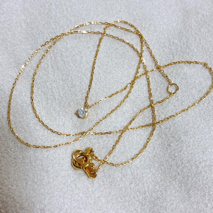 Agete K18 gold necklace with a 0.05ct diamond pendant on a delicate chain