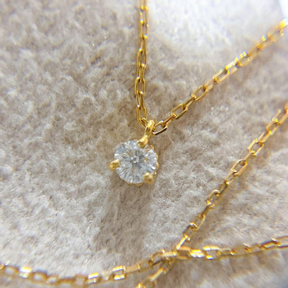 Agete K18 gold necklace with a 0.05ct diamond pendant on a delicate chain