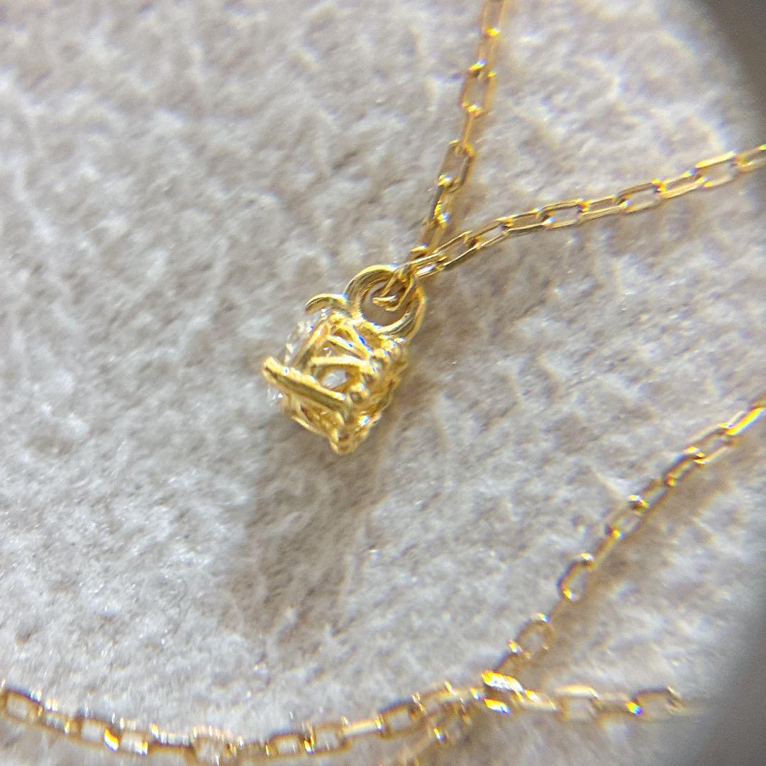 Agete K18 gold necklace with a 0.05ct diamond pendant on a delicate chain