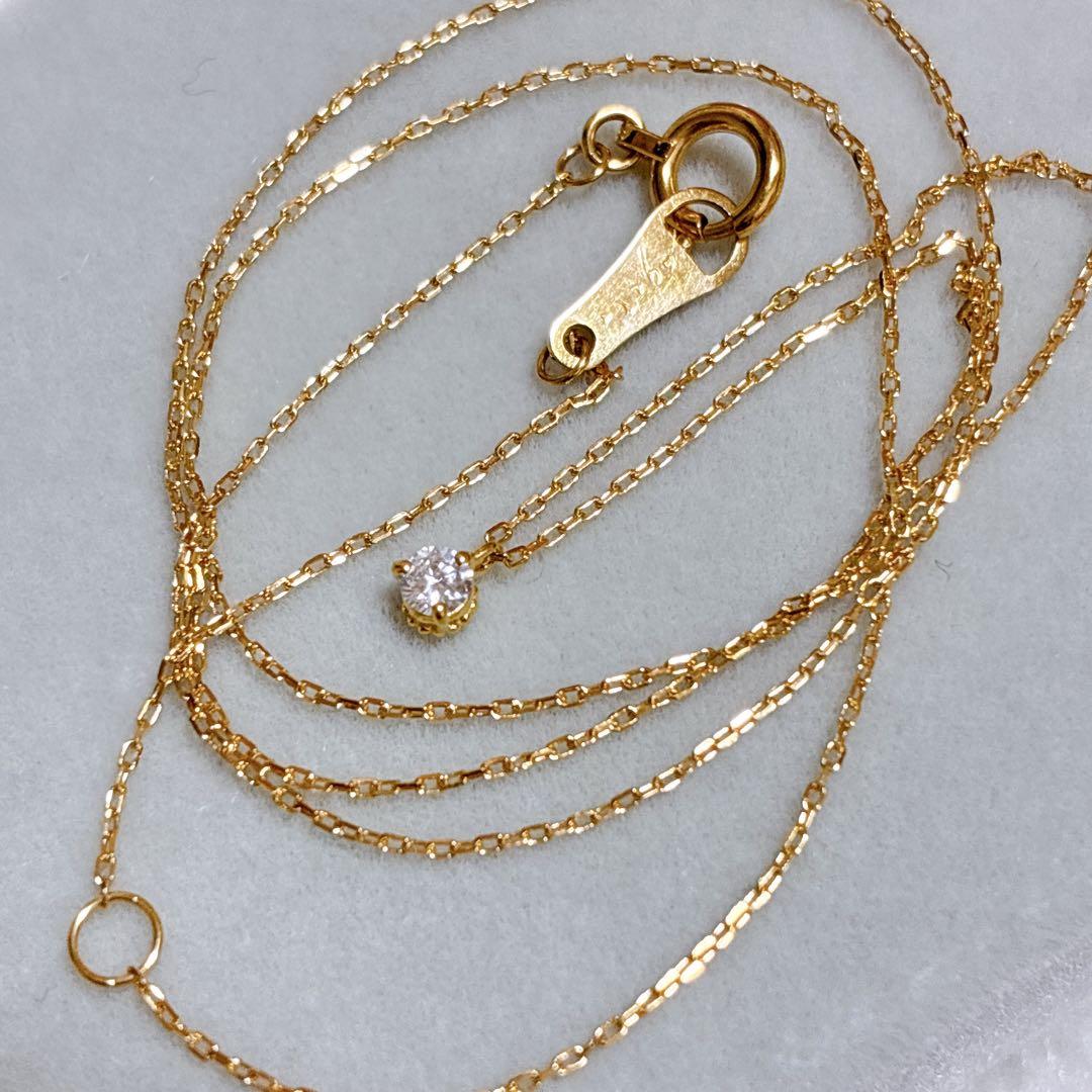 Agete K18 gold necklace with a 0.05ct diamond pendant on a delicate chain