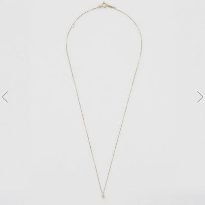 Agete K18 gold necklace with a 0.05ct diamond pendant on a delicate chain