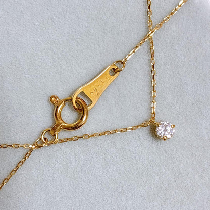 Agete K18 gold necklace with a 0.05ct diamond pendant on a delicate chain