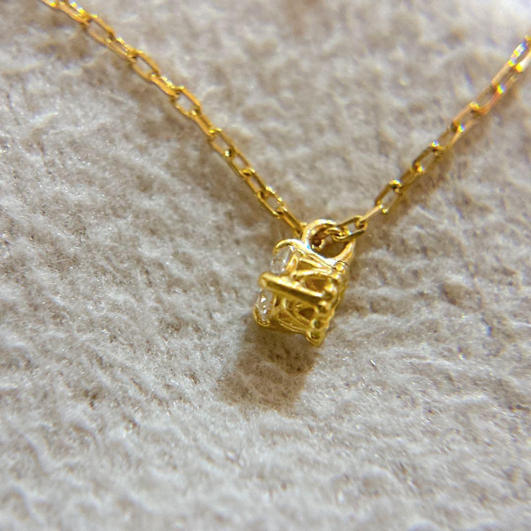 Agete K18 gold necklace with a 0.05ct diamond pendant on a delicate chain