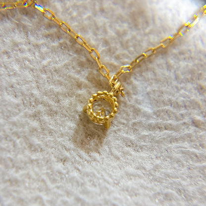 Agete K18 gold necklace with a 0.05ct diamond pendant on a delicate chain