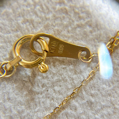 Agete K18 gold necklace with a 0.05ct diamond pendant on a delicate chain