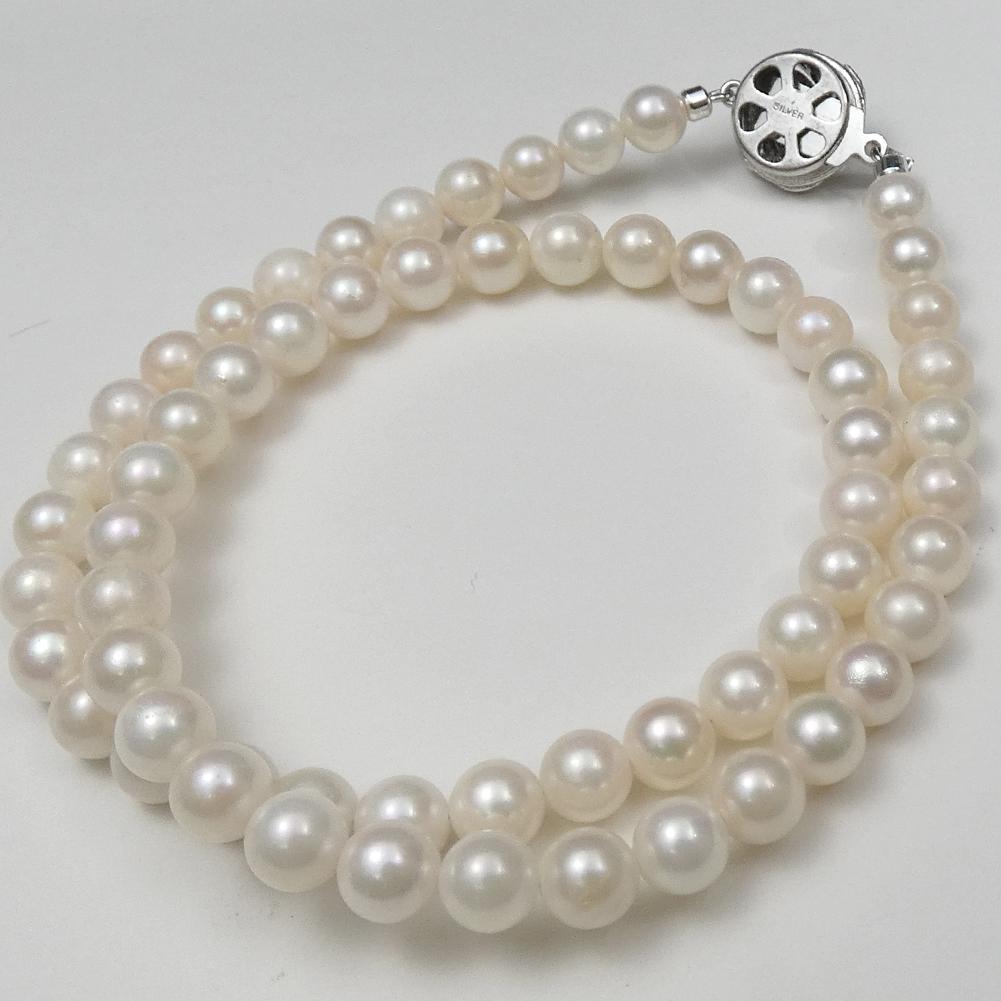 Akoya real pearl necklace with 6.0-6.5mm pearls and 42cm (16.5 in) length displayed on white background